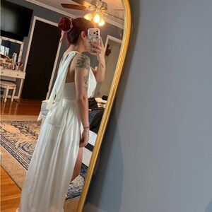 Elegant White Sleeveless Jumper with removable skirt overlay